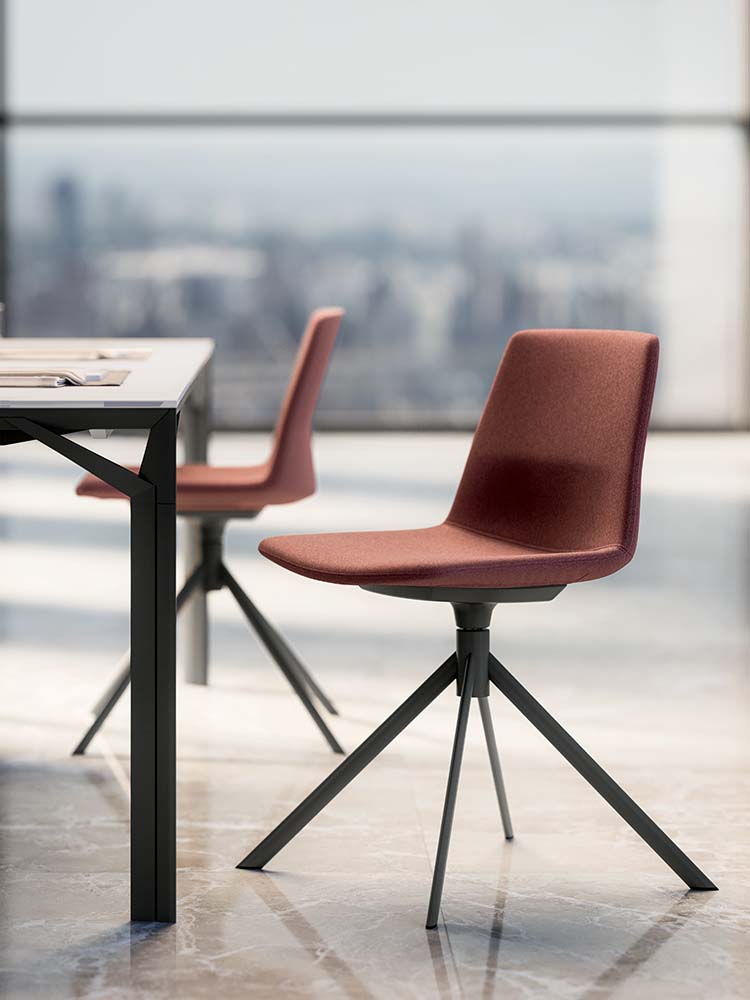 Clue vergaderstoelen in rood op een zwarte kruisvoet aan tafel