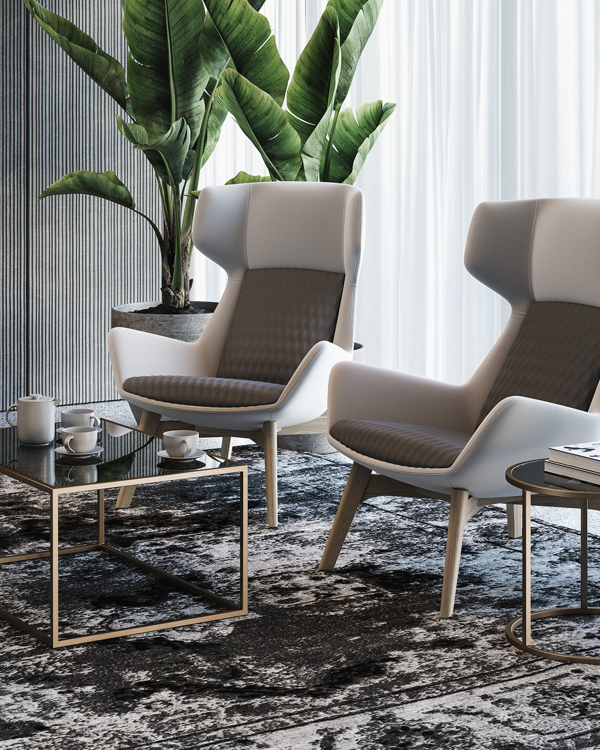 Samba High fauteuils in grijs in een lichte ruimte met planten