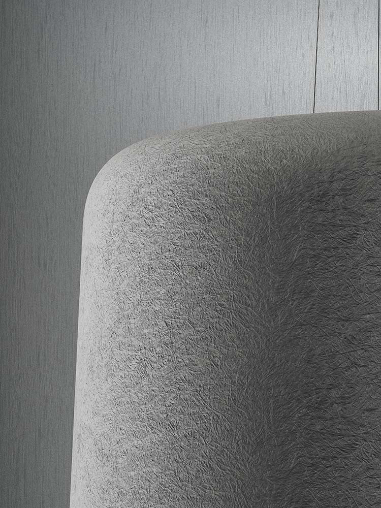 Staande lamp met witte fiberglas kap op een zwarte drievoet